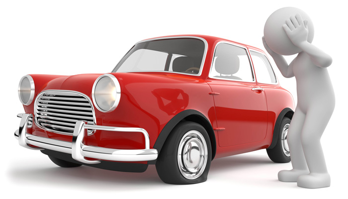 パンクした車のタイヤ